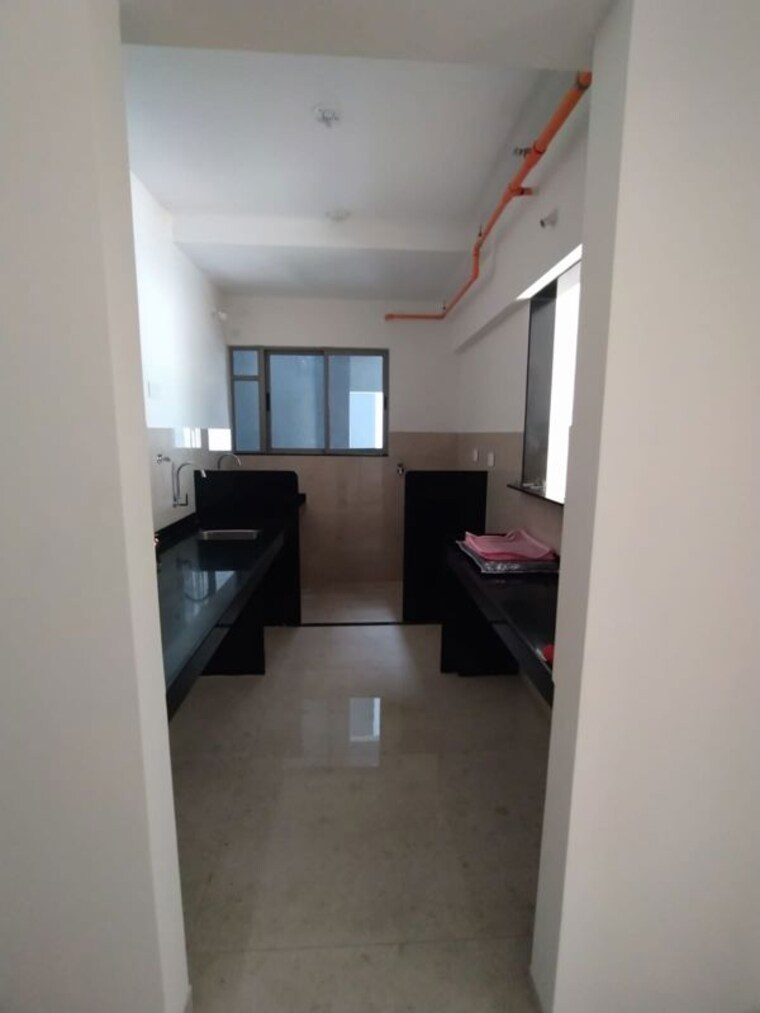 Kitchen, vj-yashwin-nuovo-centro 2 Bedroom 735 Sq.Ft. Apartment In Wakad Pune 9958749
