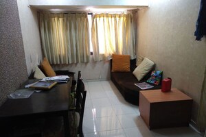 Living Room in 1 BHK Apartment at NG Complex, Andheri East – for Sale