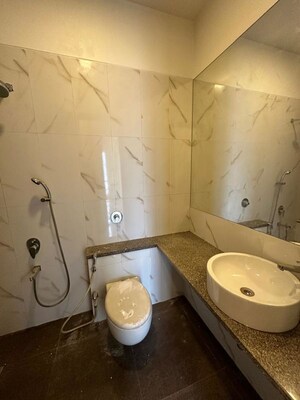 Bathroom in 3 BHK Apartment at Omkar Alta Monte, Malad East – for Rent