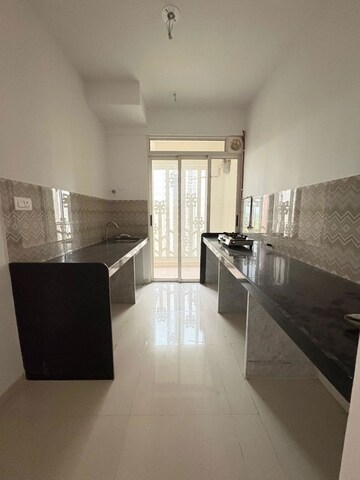 Kitchen in 2 BHK Apartment at Lodha Codename Premier, Dombivli East – for Rent