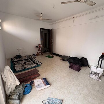 Living Room in 1 BHK Apartment at Lodha Lakeshore Greens, Hedutane – for Rent