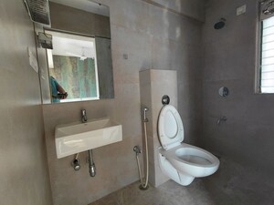 Bathroom in 2 BHK Apartment at Ani Anu Sri Balaji Enclave, Malad West – for Rent