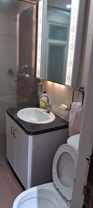 Bathroom in 3 BHK Apartment at Gaur Sportswood Arcade, Sector 79 – for Rent