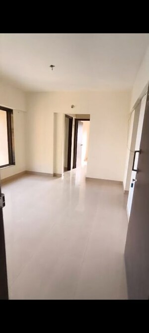 Room in 2 BHK Apartment at Runwal Garden City, Balkum Pada – for Sale