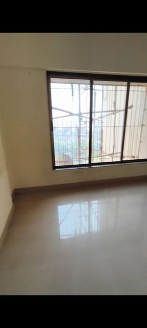 Room in 2 BHK Apartment at Runwal Garden City, Balkum Pada – for Sale