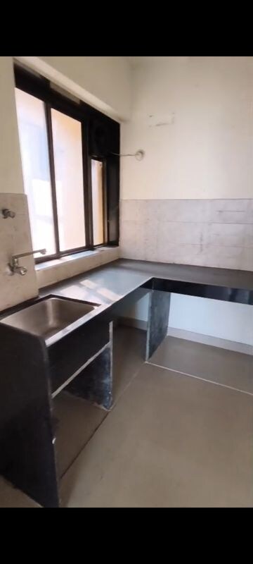 Kitchen in 2 BHK Apartment at Runwal Garden City, Balkum Pada – for Sale