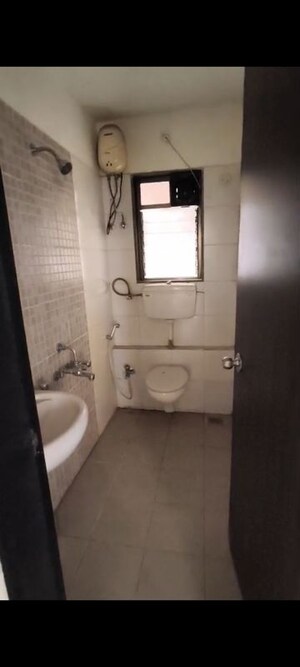 Bathroom in 2 BHK Apartment at Runwal Garden City, Balkum Pada – for Sale