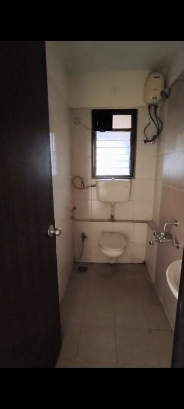 Bathroom in 2 BHK Apartment at Runwal Garden City, Balkum Pada – for Sale