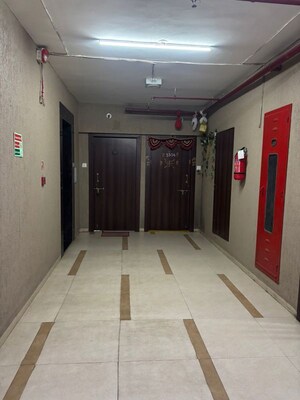 Building Lobby in 1 BHK Apartment at Swastik Residency 1, Ghodbunder Road – for Rent