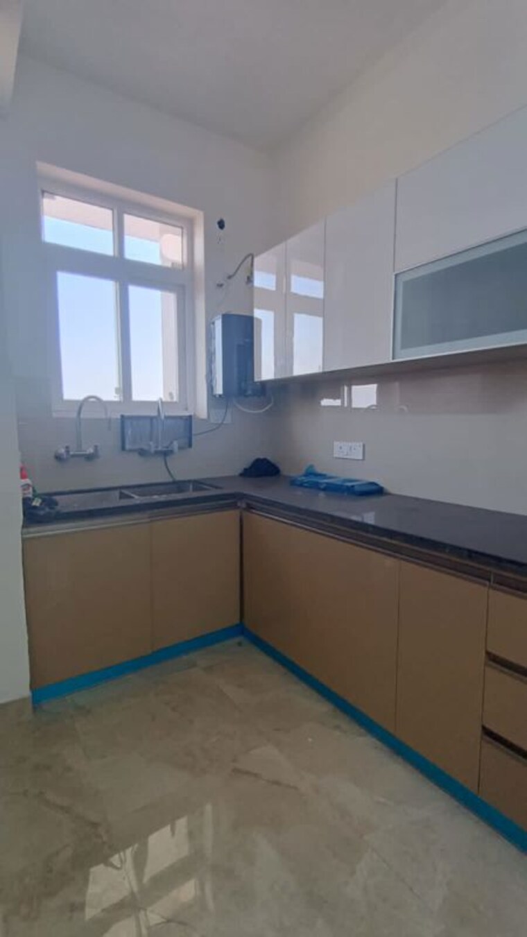 Kitchen, artique-uptown-skylla 2 Bedroom 1170 Sq.Ft. Apartment In International Airport Road Zirakpur 9959920