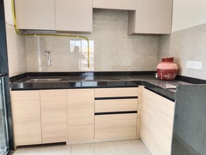 Kitchen in 1.5 BHK Apartment at Our Home CHS, Andheri West – for Sale