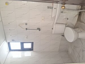 Bathroom in 2 BHK Apartment at Charms Castle, Raj Nagar Extension – for Sale