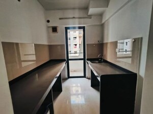 Kitchen in 1.5 BHK Apartment at Lodha Palava City Lakeshore Greens, Dombivli East – for Sale