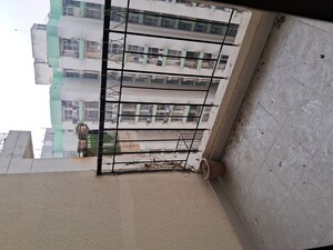 Staircase in 2 BHK Apartment at Charms Castle, Raj Nagar Extension – for Sale