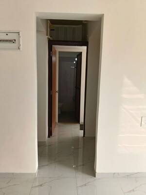 Building Lobby in 1 BHK Apartment at Lodha Vista, Lower Parel – for Rent