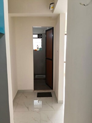 Building Lobby in 1 BHK Apartment at Lodha Vista, Lower Parel – for Rent