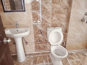 Bathroom in 2 BHK Apartment at Prateek Grand City, Siddharth Vihar – for Rent