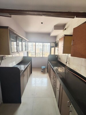 Kitchen in 2 BHK Apartment at Happy Valley, Manpada – for Rent