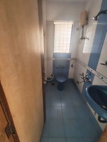 Bathroom in 2 BHK Apartment at Happy Valley, Manpada – for Rent