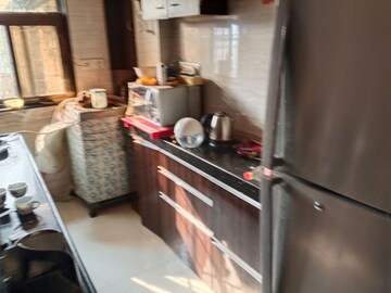 Kitchen in 2 BHK Apartment at Geeta Nagar CHS, Mira Road – for Rent