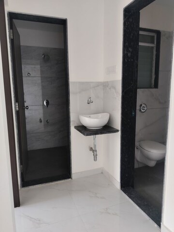 Bathroom in 1 BHK Apartment at Metropolis Bayside, Kasarvadavali – for Sale