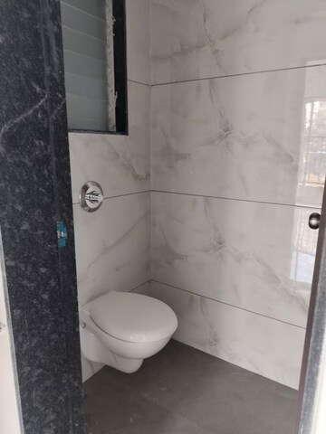 Bathroom in 1 BHK Apartment at Metropolis Bayside, Kasarvadavali – for Sale