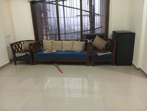 Living Room in 2 BHK Apartment at Runwal Garden City, Balkum Pada – for Rent