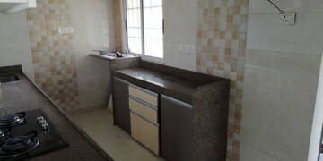 Kitchen in 2 BHK Apartment at Poddar Matushree Garden Estate 2, Goregaon West – for Rent