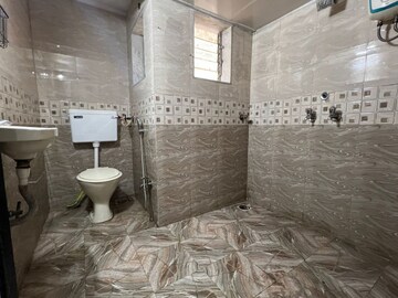 Bathroom in 3 BHK Apartment at Riddhi Tower, Malad East – for Rent