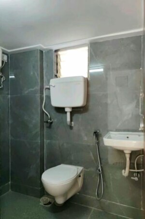 Bathroom in 3 BHK Apartment at Builtron Ambaji Apartment, Mulund West – for Rent