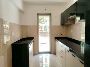 Kitchen in 3 BHK Apartment at Builtron Ambaji Apartment, Mulund West – for Rent