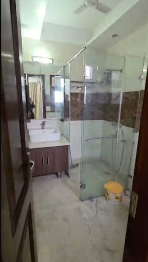 Bathroom in 4 BHK Builder Floor at Nehru Enclave – for Rent