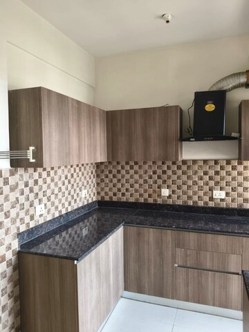 Kitchen in 3 BHK Apartment at Adani Oyster Grande Phase 2, Sector 102 – for Rent