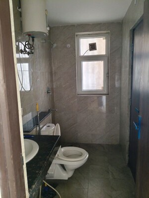 Bathroom in 3 BHK Apartment at Adani Oyster Grande Phase 2, Sector 102 – for Rent