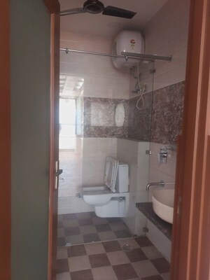 Bathroom in 3 BHK Apartment at Panchsheel Enclave – for Rent