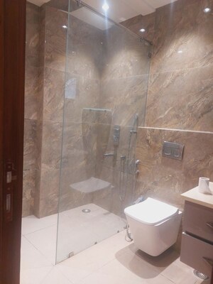 Bathroom in 3 BHK Apartment at Panchsheel Enclave – for Rent