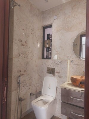 Bathroom in 3 BHK Apartment at Panchsheel Enclave – for Rent