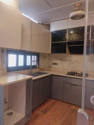 Kitchen in 3 BHK Apartment at Panchsheel Enclave – for Rent