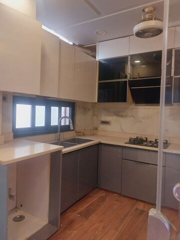 Kitchen in 3 BHK Apartment at Panchsheel Enclave – for Rent