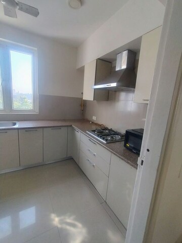 Kitchen in 4 BHK Apartment at Emaar MGF The Palm Drive Villas, Sector 66 – for Rent