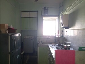 Kitchen in 2 BHK Apartment at Rutu Enclave, Kasarvadavali – for Rent