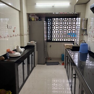 Kitchen in 2 BHK Apartment at Lok Rachana, Moti Nagar – for Sale