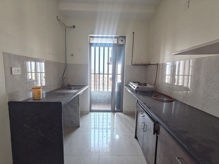 Kitchen, kalpataru-paramount 2 Bedroom 711 Sq.Ft. Apartment In Kapur Bawdi Thane 9962558