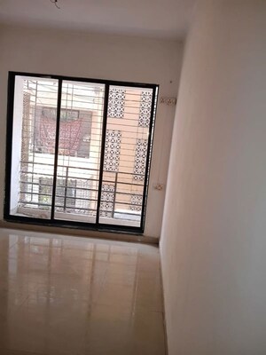 Living Room in 1 BHK Apartment at Sahara CHS, Taloja Sector 11 – for Sale