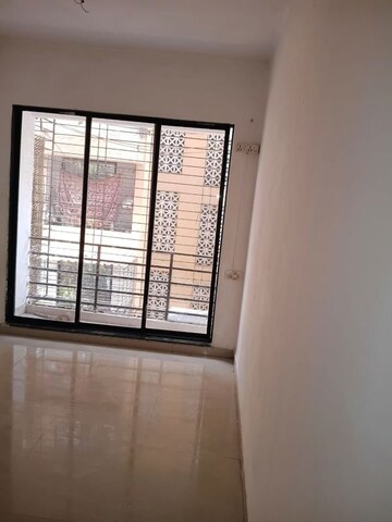 Living Room in 1 BHK Apartment at Sahara CHS, Taloja Sector 11 – for Sale