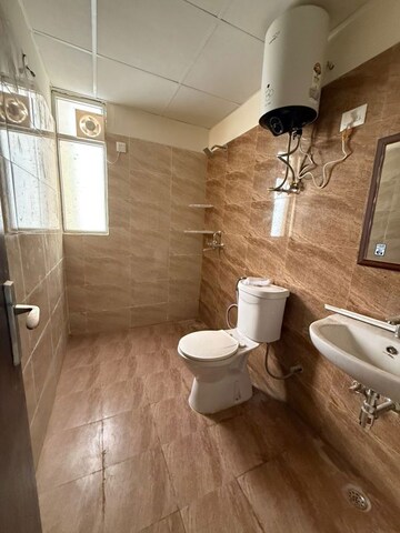 Bathroom in 3 BHK Apartment at Amrapali Crystal Homes, Sector 76 – for Rent