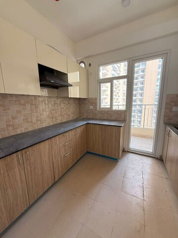 Kitchen in 3 BHK Apartment at Amrapali Crystal Homes, Sector 76 – for Rent