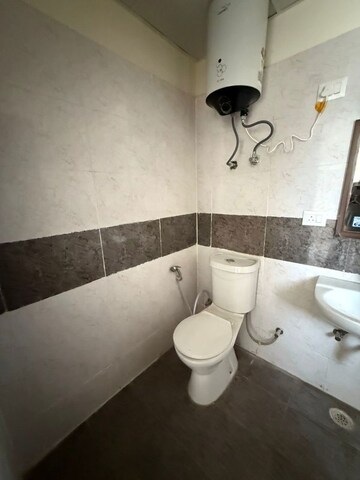 Bathroom in 3 BHK Apartment at Amrapali Crystal Homes, Sector 76 – for Rent