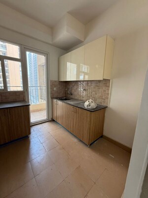 Kitchen in 3 BHK Apartment at Amrapali Crystal Homes, Sector 76 – for Rent