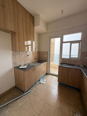 Kitchen in 3 BHK Apartment at Amrapali Crystal Homes, Sector 76 – for Rent